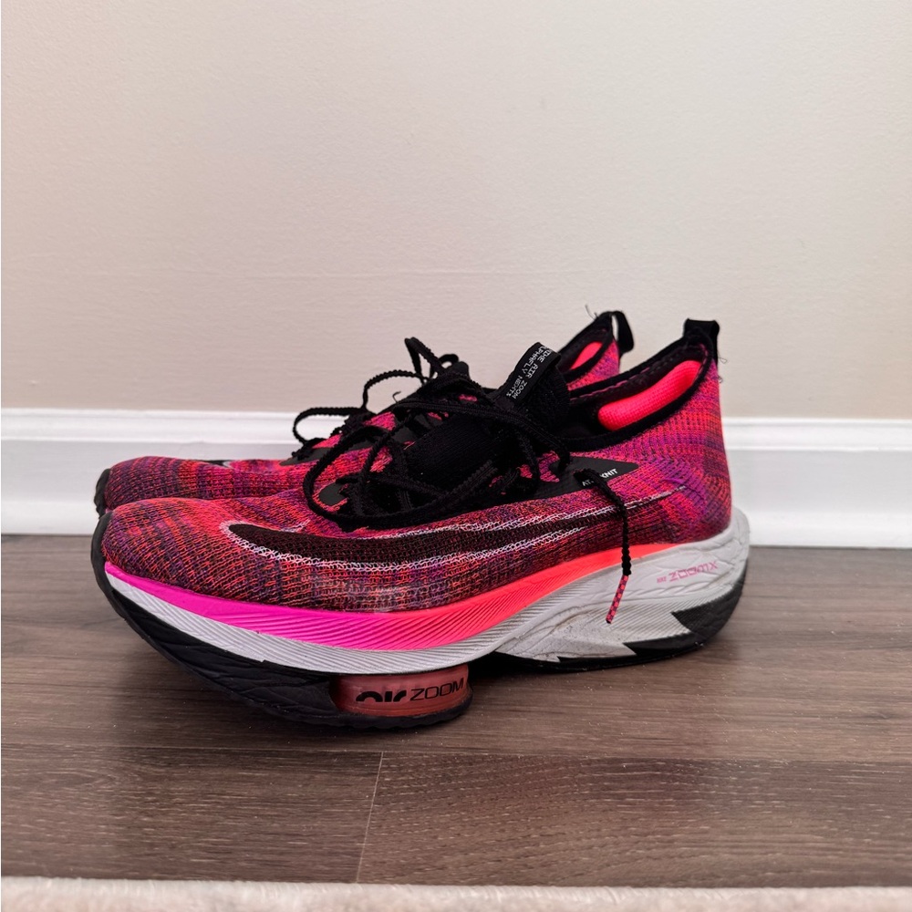 Nike Pink Flyknit Running Shoes